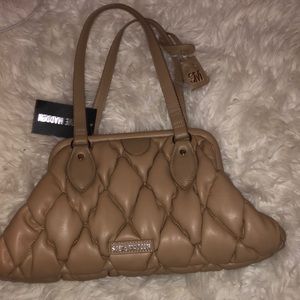 Steve Madden handbag, tan, quilted, unused with tags on. Can’t find online.